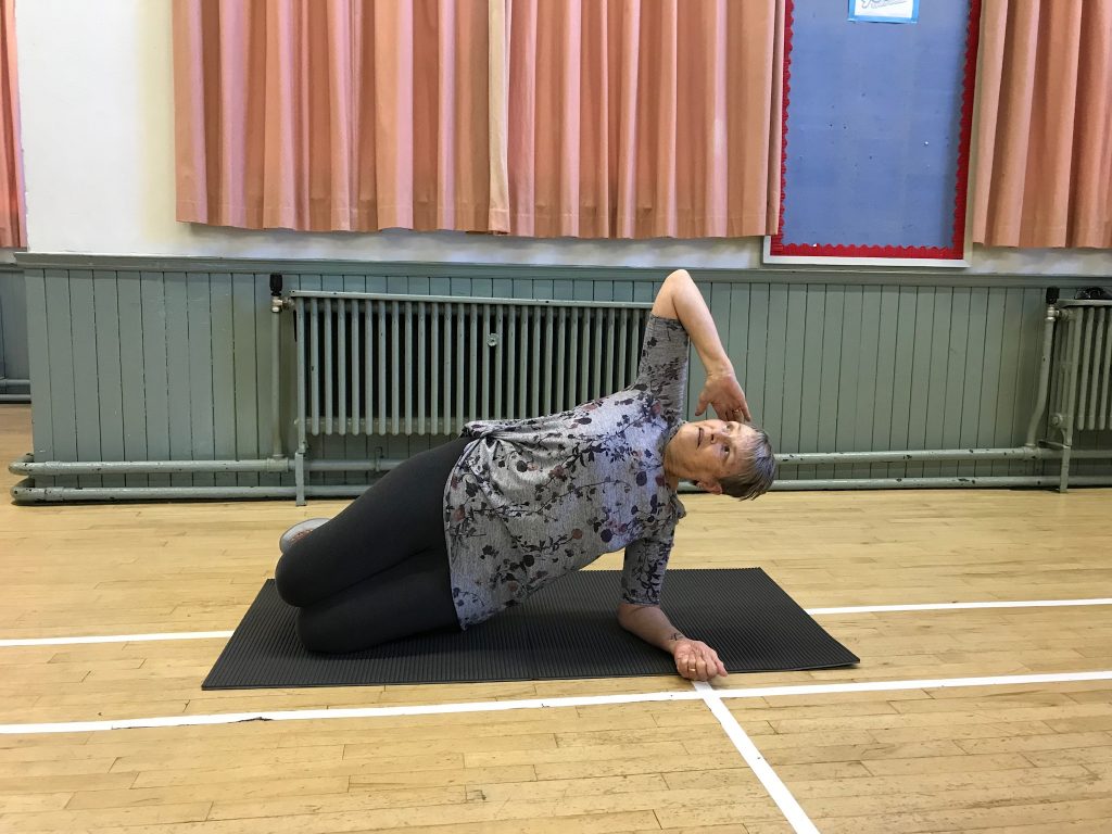 Picture of Diana demonstrating Pilates position